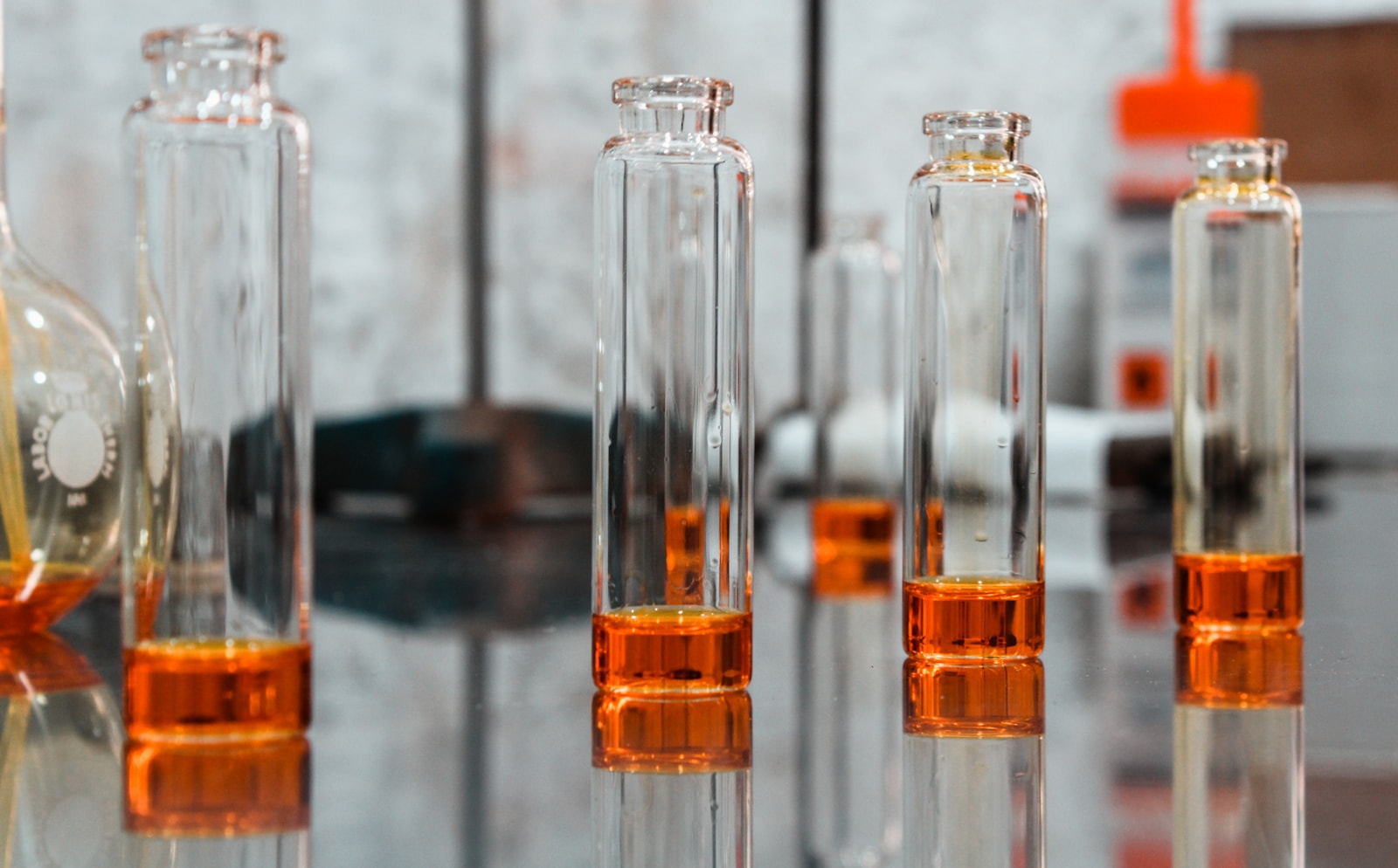 Glass laboratory vials on a research bench